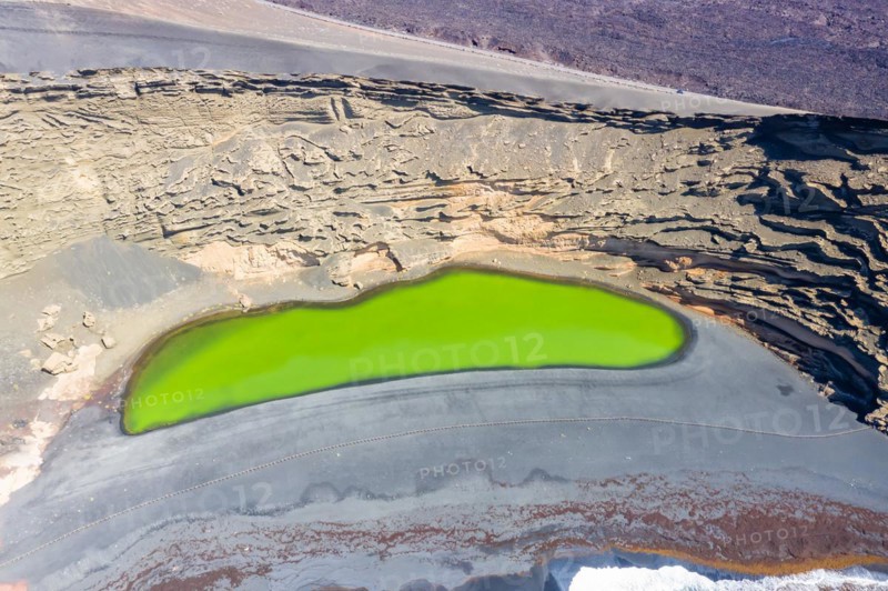 Green lake Charco de Los Clicos Verde near El Golfo in the Canary Islands Aerial view on the island of Lanzarote