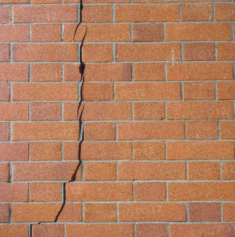 Cracked brick wall