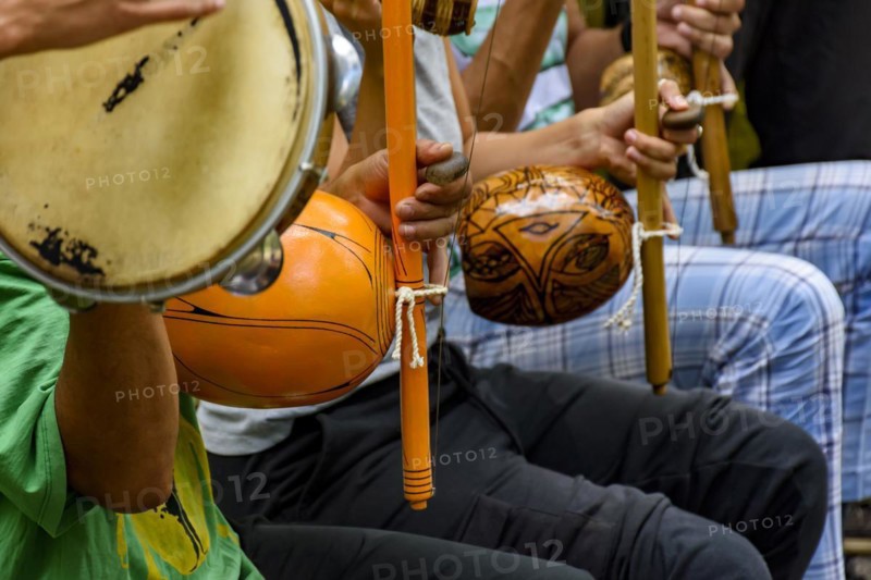 Afro Brazilian percussion musical instruments during a capoeira performance in the streets of Brazil