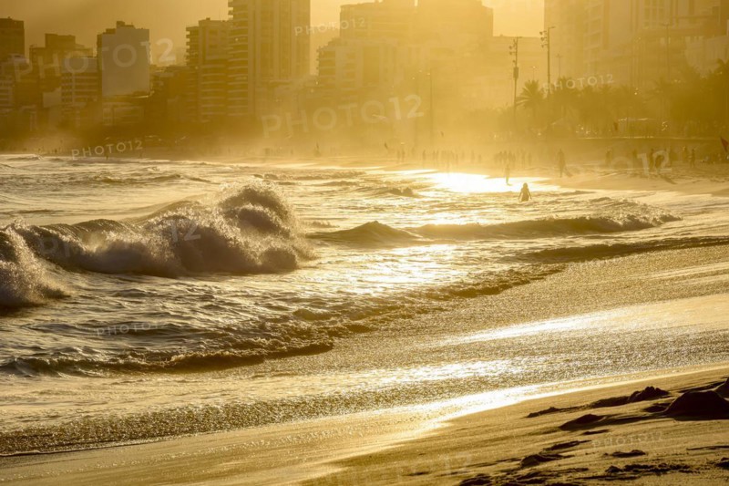 Summer sunset at Ipanema beach in Rio de Janeiro with its sea