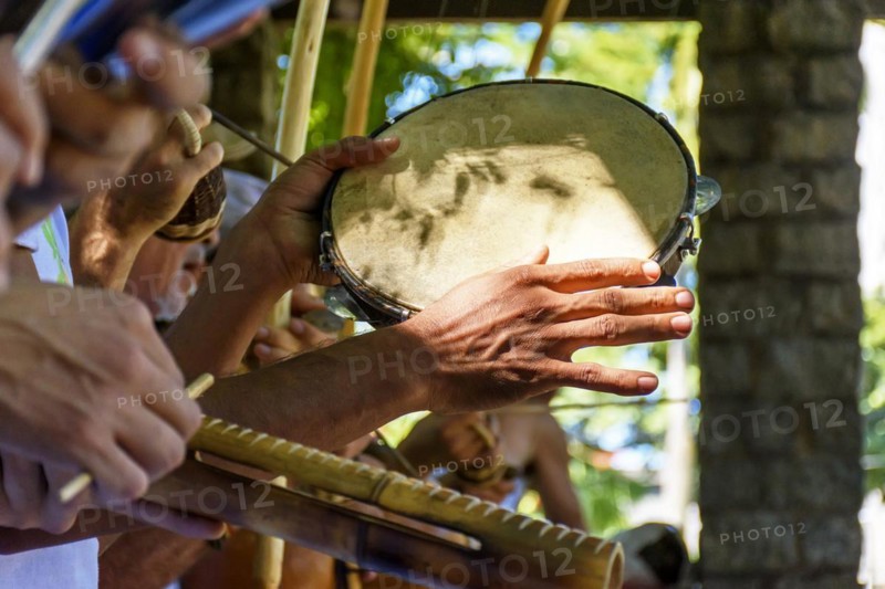 Tambourine and others usually rustics brazilian percursion instruments used during capoeira brought from africa and modified by the slaves