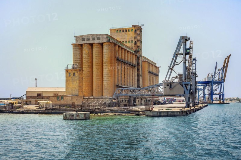 Grain silo and cranes in the port of Port Sudan