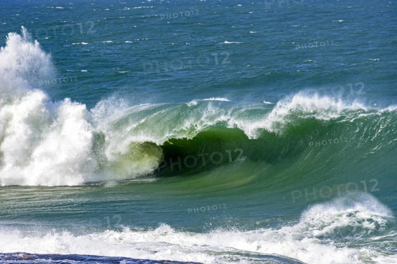 Strong wave breaking hard in the sea waters of Ipanema beach in Rio de Janeiro