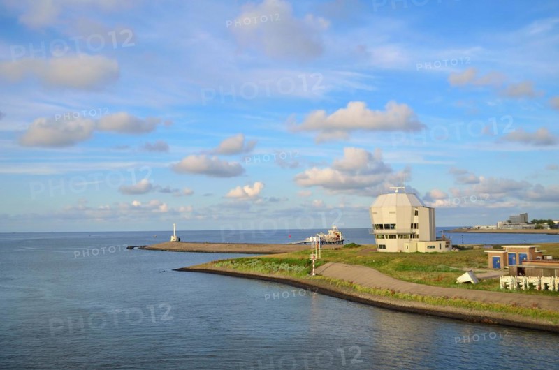 Part of harbor with ocean at Den Helder in the Netherlands on summer day