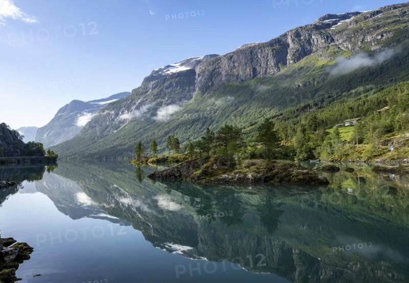 Mountains reflected in blue lake