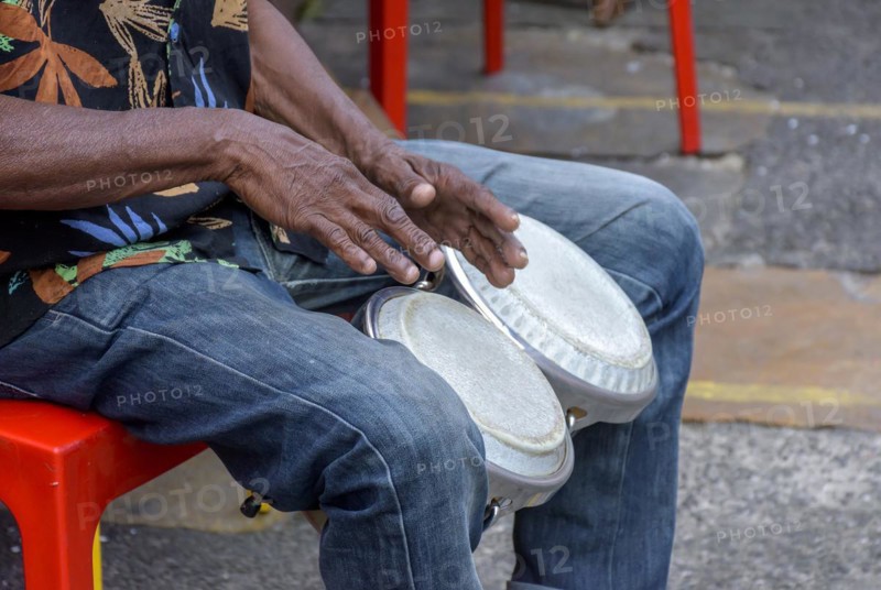 Bongos drum player in the streets of Salvador city during brazilian samba presentation