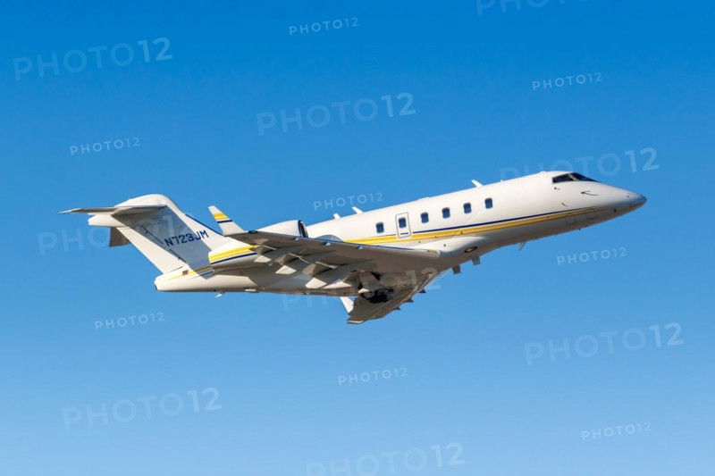 A private Bombardier Challenger 300 aircraft with registration N723JM at West Palm Beach Airport