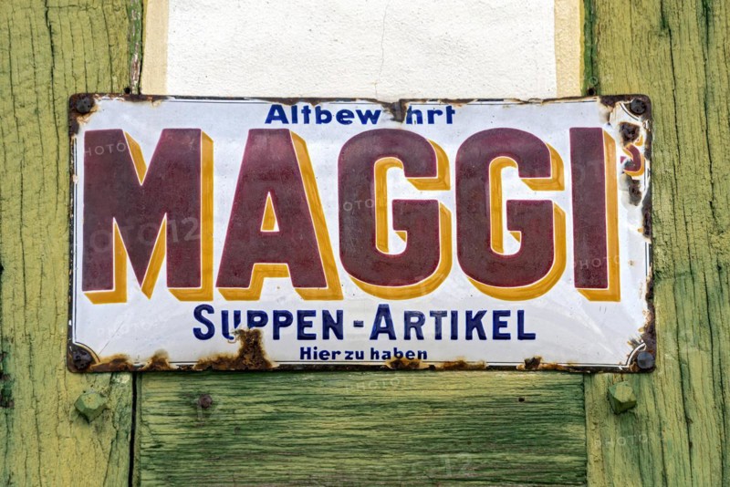 Rusty historical enamel sign