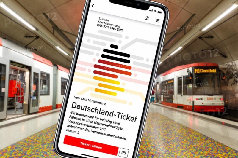 Germany ticket D-ticket or 49 euro ticket on a mobile phone with a light rail metro underground photo montage in Dortmund