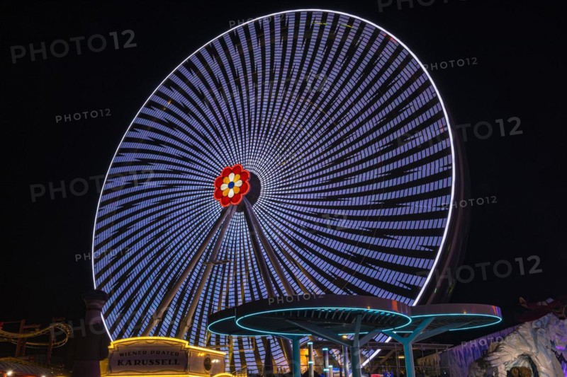 Illuminated flower wheel at the Prater