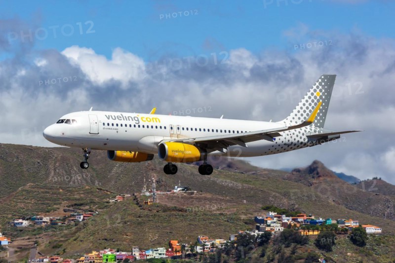 An Airbus A320 aircraft of Vueling with registration number EC-MVE at Tenerife Airport