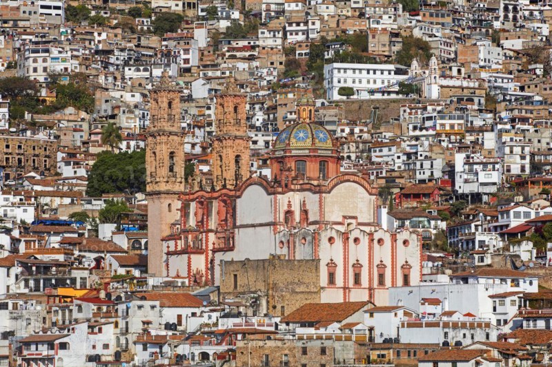 View over the colonial city centre of Taxco de Alarcon and the 18th century Church of Santa Prisca