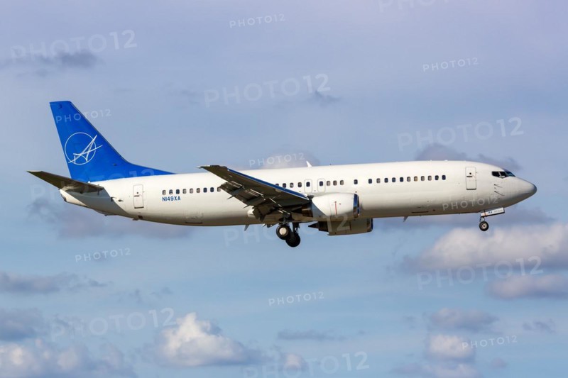 A Boeing 737-400 aircraft of iAero Airways with registration N149XA at Miami Airport