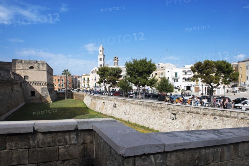 View over the moat of Castello Normanno-Svevo to the tower of San Sabino Cathedral in Bari
