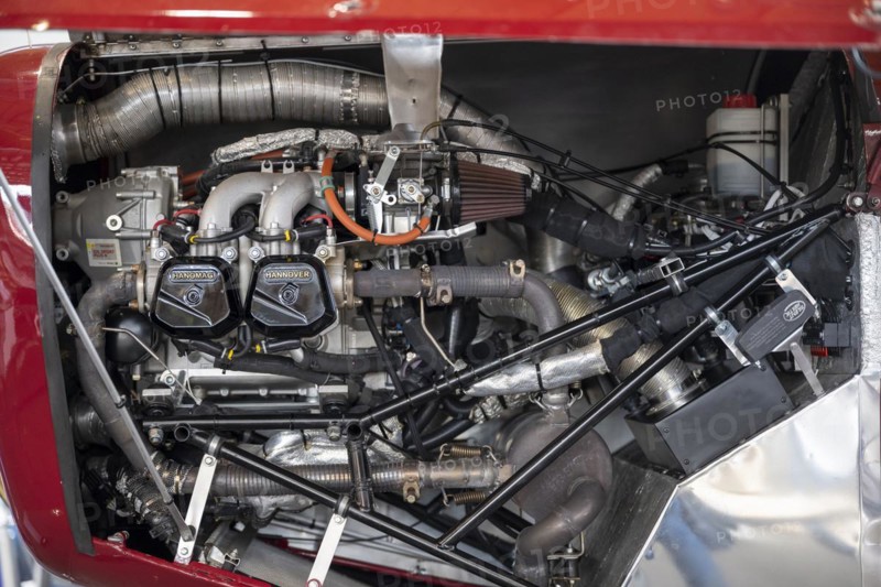 View into the engine compartment of a biplane with a Rotax 912 reciprocating engine
