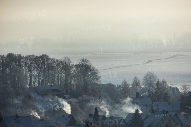 Smoke is visible from the chimneys on an icy morning in Koenigshain