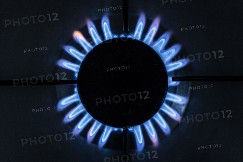 A blue flame on a gas cooker