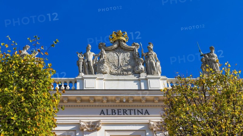 Golden Crown and Marble Statues on the Roof of the Albertina