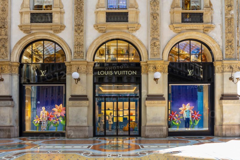 Shop window of the luxury shop LOUIS VUITTON at Galleria Vittorio Emanuele II