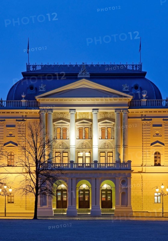 Illuminated Mecklenburg State Theatre in the evening