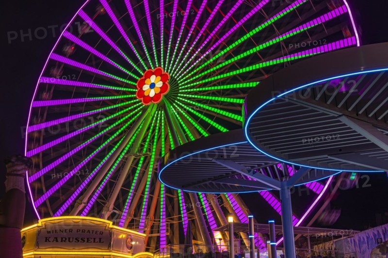Illuminated flower wheel at the Prater