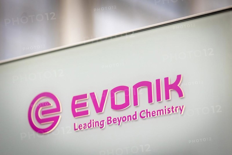 A sign of the evonik company at their headquarters in Essen