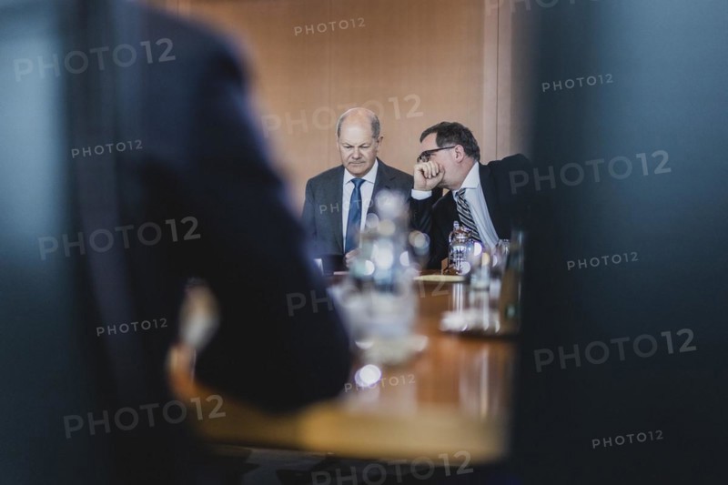 (L-R) Olaf Scholz (SPD), Federal Chancellor, and Wolfgang Schmidt (SPD), Head of the Federal Chancellery, taken during the weekly meeting of the Cabinet in Berlin, 03.05.2023., Berlin, Germany, Europe