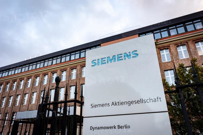 A Siemens company sign in front of a branch office in Siemensstadt in Berlin