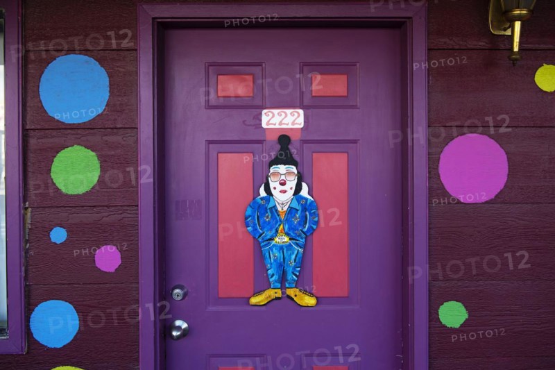 Door with Elvis Presley in Clown Costume