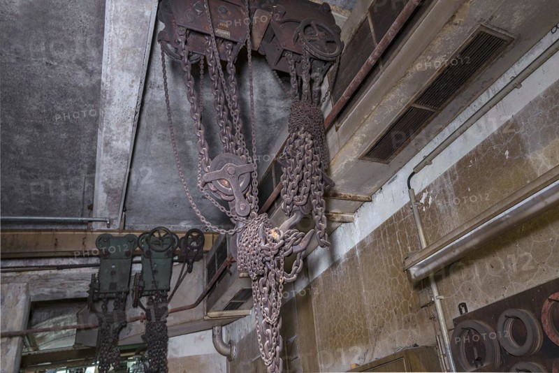 Chains from a pulley block of a former paper factory