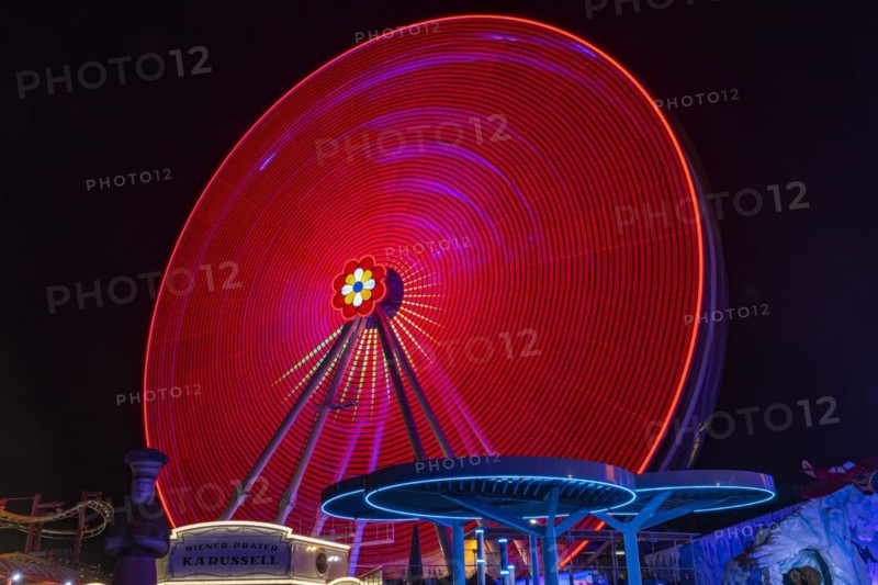 Illuminated flower wheel at the Prater