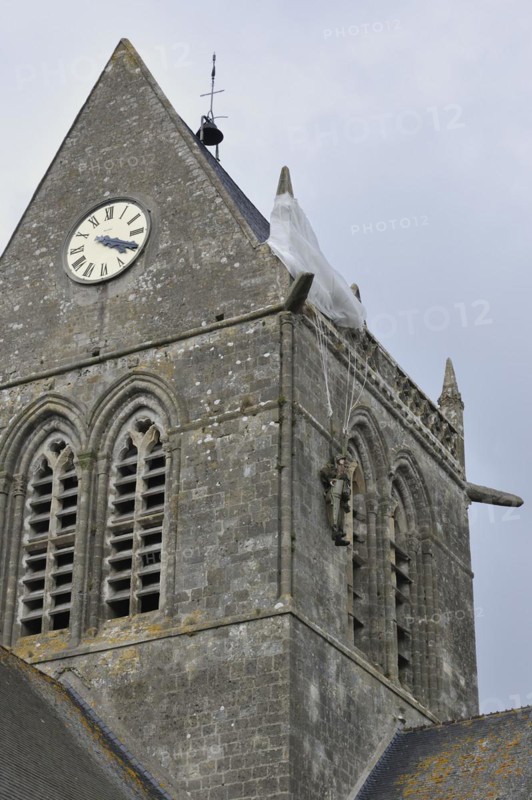 Parachute Memorial in honour of paratrooper John Steele who was caught on the church spire during D-Day