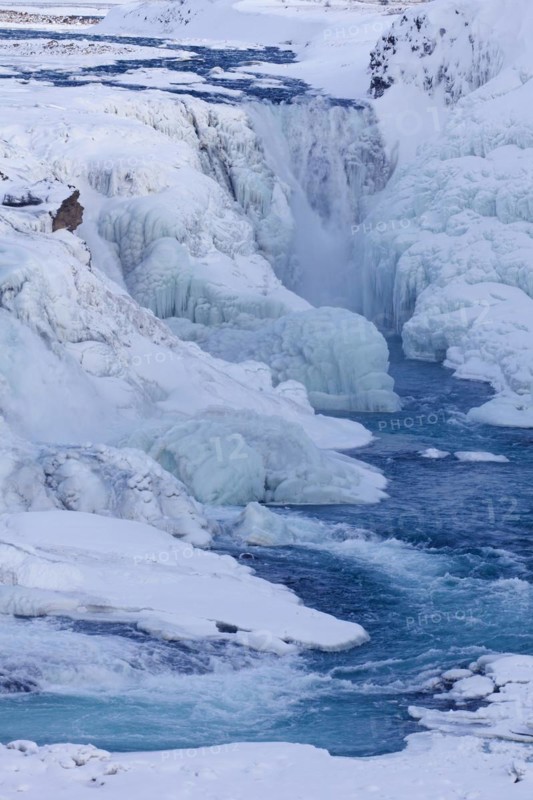 Gullfoss waterfall in the snow in winter located in the canyon of Hvita river