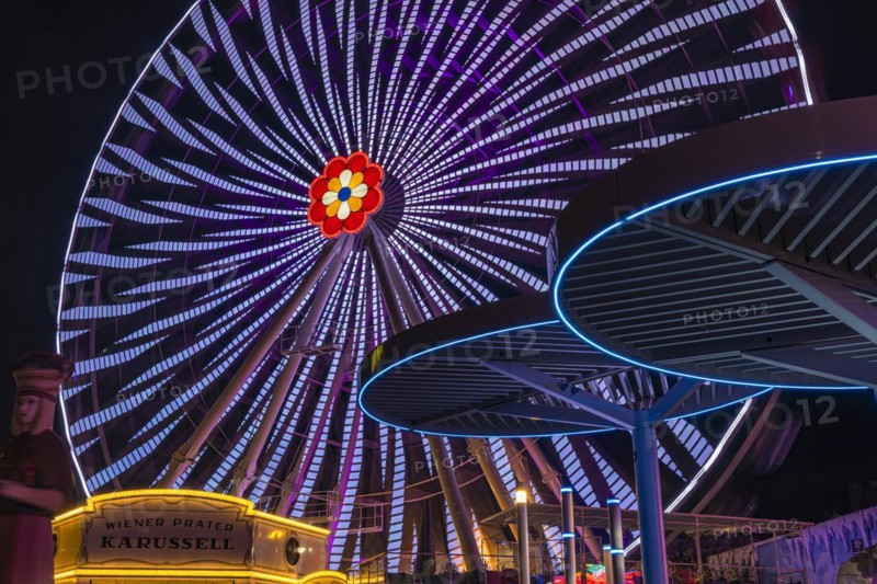Illuminated flower wheel at the Prater