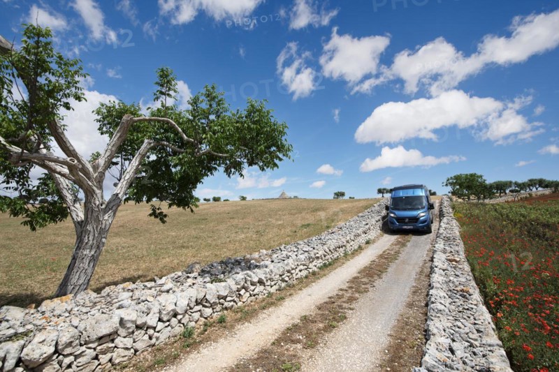 Camper van on a side road between Noci and Alberobello