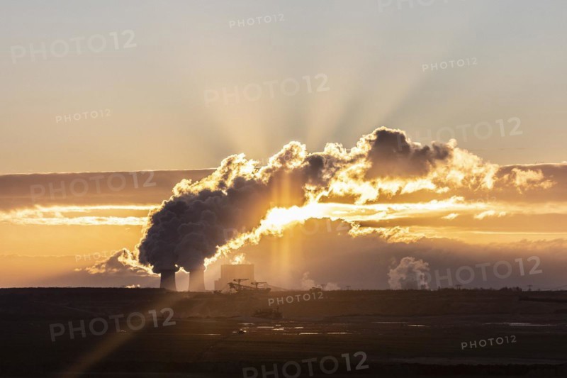 The Schwarze Pumpe coal-fired power plant stands out against the rising sun