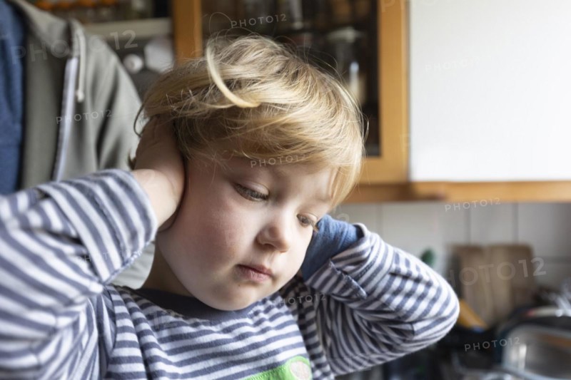 Subject: Toddler covers her ears