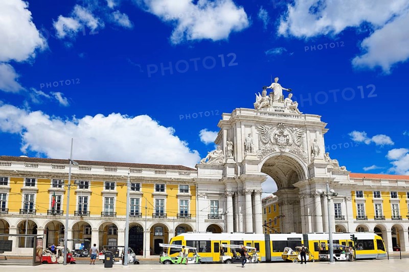 Tramway in front of the Arc de Triomphe Arco da Rua Augusta