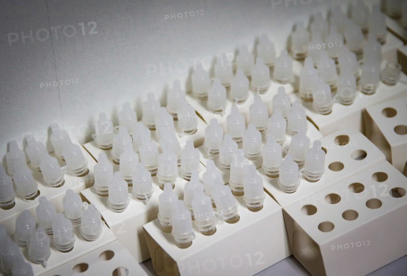 Rapid test sample cups ready for use in a COVID-19 vaccination and testing centre at Autohaus Olsen in Iserlohn