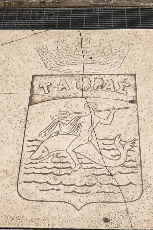 Neptune with trident on fish