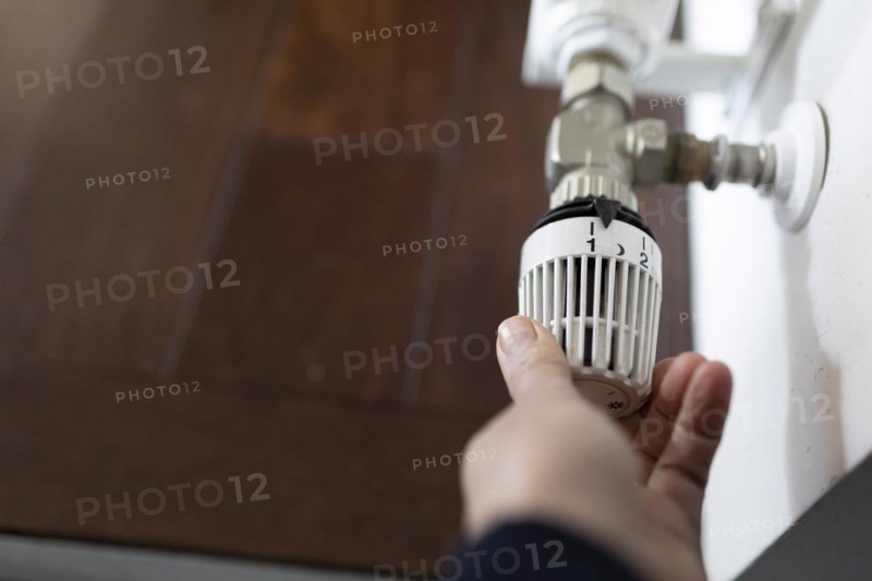 Thermostat on a radiator in a detached house