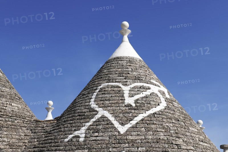 Trulli with symbol on the roof