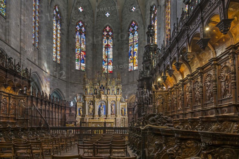 Carved wooden choir stalls and altar in the Cathedrale Notre-Dame de Saint-Bertrand-de-Comminges cathedral