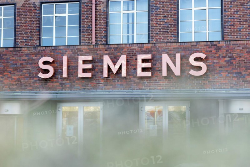 A Siemens company sign in front of a branch office in Siemensstadt in Berlin