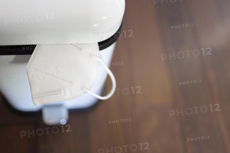FFP2 protective mask in the dustbin. End of compulsory masks in Germany.