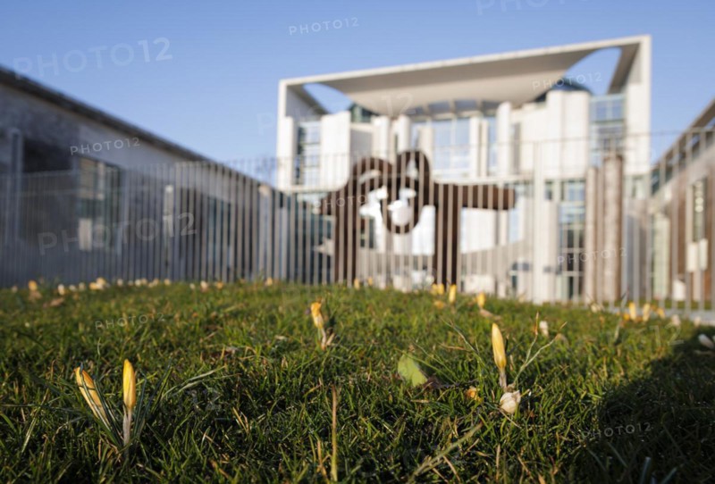 Crocuses bloom in front of the Federal Chancellery in Berlin. 16.03.2022.