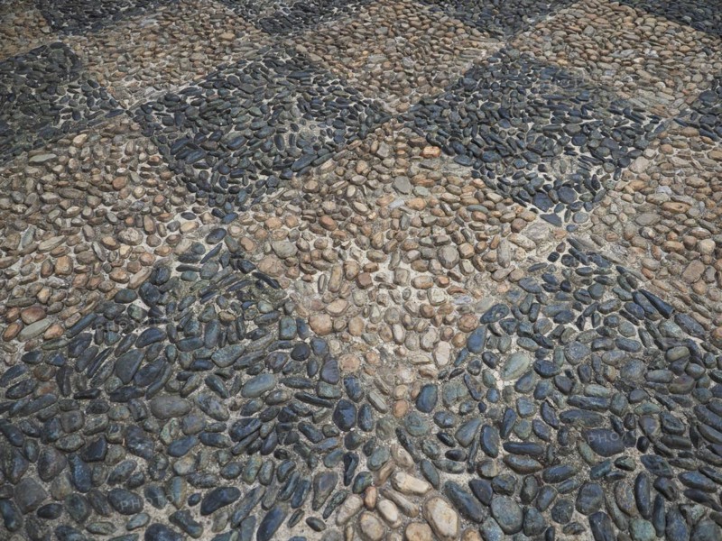Concrete and pebble tiles floor