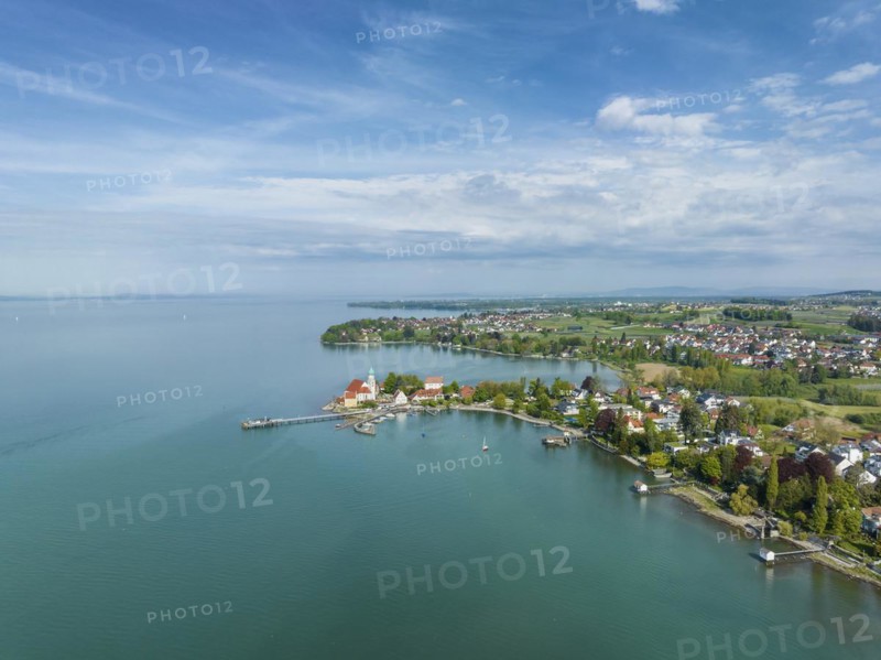 Aerial view of the moated castle peninsula on Lake Constance with the baroque church of St. George