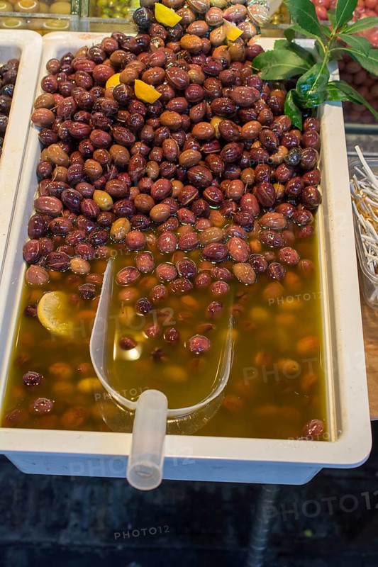 Turkish style prepared olives in the market stands