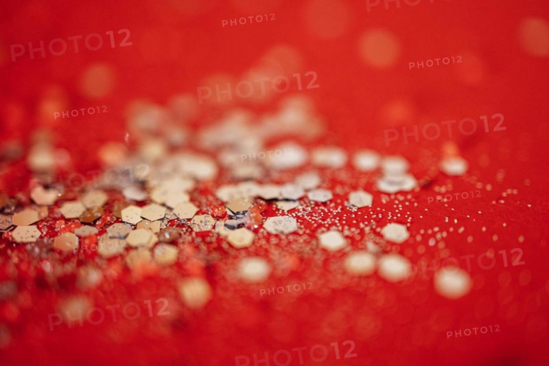 Red tone blurs the bokeh light. Defocused Red and orange holiday bokeh. Abstract christmas background